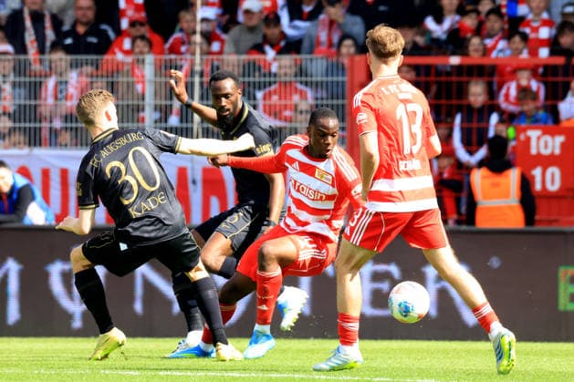 DEU, DFL, 1 FBL, 1 FC Union vs FC Augsburg, 16 05 2026, Stadion Alte Foersterei, Berlin, DEU, DFL, 1 FBL, 1 FC Union vs FC Augsburg, pictured Ilyas Ansah 1 FC Union Berlin 10 , Andras Schaefer 1 FC Union Berlin 13 , Chrislain Matsima FC Augsburg 5 , Anton Kade FC Augsburg 30 DFL regulations prohibit any use of Photographs as image sequences and or quasi video nordphotoxGmbHx xEngler nph00076