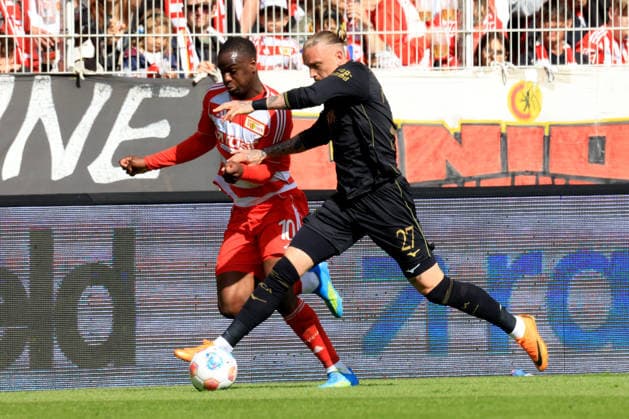 DEU, DFL, 1 FBL, 1 FC Union vs FC Augsburg, 16 05 2026, Stadion Alte Foersterei, Berlin, DEU, DFL, 1 FBL, 1 FC Union vs FC Augsburg, pictured Ilyas Ansah 1 FC Union Berlin 10 , Marius Wolf FC Augsburg 27 DFL regulations prohibit any use of Photographs as image sequences and or quasi video nordphotoxGmbHx xEngler nph00076