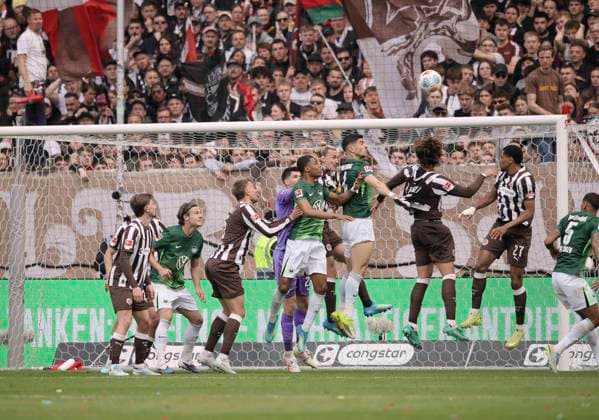 Photo header to 0 1 for Wolfsburg , center Konstantinos KOULIERAKIS Wolfsburg vs Jackson Irvine Pauli Soccer 1 Bundesliga , 34 Matchday on Sat 16 05 2026 FC St Pauli VfL Wolfsburg
