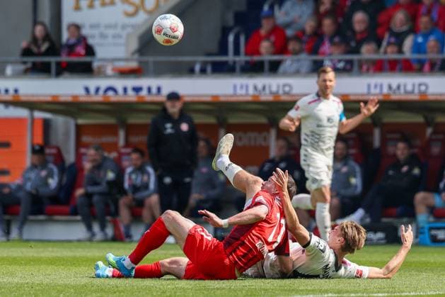 Action between Budu Zivzivadze 12 1FC Heidenheim 1846 and Kacper Potulski 48 1 FSV Mainz 05 , 1 FC Heidenheim vs 1 FSV Mainz 05, Fußball, Maenner, Bundesliga, DFL, Saison 2025 2026, 34 Spieltag, Rueckrunde, 16 05 2026 DFB regulations prohibit any use of photographs as image sequences and or quasi video Heidenheim Baden Wuerttemberg Germany Copyright: xkolbert-press MartinxAgüerax