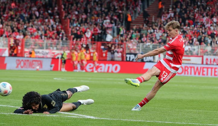 Andras Schäfer scores the goal for the 3 0 duel Match scene Action Sport Football Soccer Bundesliga Men DFL 34 Matchday Season 2025 2026 16 05 2026 1 FC Union Berlin FCU vs FC Augsburg FCA DFL regulations prohibit any use of photographs as image sequences and or quasi video