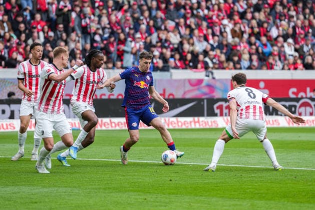 1 Bundesliga SC Freiburg vs RB Leipzig, 16 05 2026 Fight for the ball between Jordy Makengo SC Freiburg, 33 and Brajan Gruda RB Leipzig, 10 1 Bundesliga SC Freiburg vs RB Leipzig, Europa Park Stadion, 16 05 2026 DFB DFL REGULATIONS PROHIBIT ANY USE OF PHOTOGRAPHS AS IMAGE SEQUENCES AND OR QUASI VIDEO Copyright: xBEAUTIFULxSPORTS Boscox