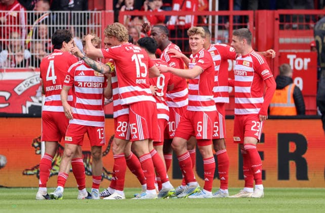 Andrej Ilic celebrates with teammates after scoring 1 0 Joy Emotion Cheering Sport Football Soccer Bundesliga Men DFL 34 Matchday Season 2025 2026 16 05 2026 1 FC Union Berlin FCU vs FC Augsburg FCA DFL regulations prohibit any use of photographs as image sequences and or quasi video