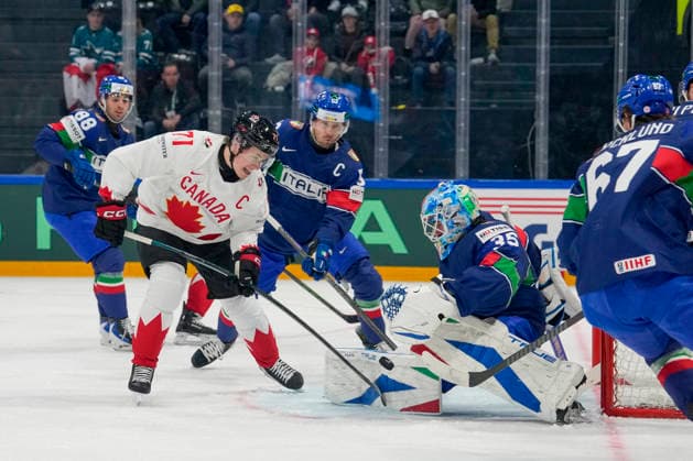 FRIBOURG, SWITZERLAND MAY 16 Macklin Celebrini of Canada L against goalkeeper Davide Fadani of Italy during the 2026 IIHF Ice Hockey World Championship Switzerland game between Italy and Canada at BCF Arena on May 16, 2026 in Fribourg, Fribourg Fribourg BCF Arena Fribourg Switzerland Copyright: xJustPictures.ch JarixPestelaccix jp-en-EuSpIm-JP6_JAR_Italy_Canada_16May2026_00004
