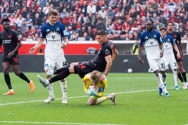 Leverkusen, Germany 16 May 2026 1 BL 2025 2026 Sp 34 Bayer 04 Leverkusen v Hamburger SV In picture from left in duel Patrik Schick LEV and goalkeeper Sander Tangvik HSV DFL DFB regulations prohibit any use of photographs as image sequences and or quasi video BayArena Nordrhein Westfalen Copyright: xFotostandx xKruczynskix