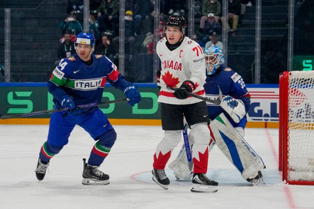 FRIBOURG, SWITZERLAND MAY 16 Macklin Celebrini of Canada C against goalkeeper Davide Fadani of Italy R and Gregorio Gios of Italy L during the 2026 IIHF Ice Hockey World Championship Switzerland game between Italy and Canada at BCF Arena on May 16, 2026 in Fribourg, Fribourg Fribourg BCF Arena Fribourg Switzerland Copyright: xJustPictures.ch JarixPestelaccix jp-en-EuSpIm-JP6_JAR_Italy_Canada_16May2026_00012