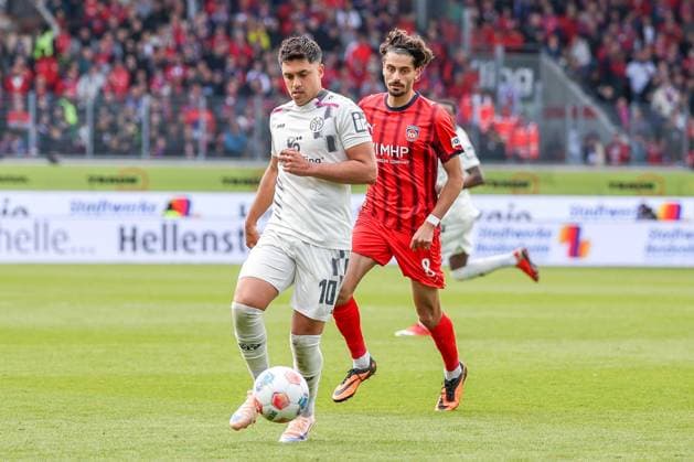 Nadiem Amiri 10 1 FSV Mainz 05 in action with Eren Dinkci 8 1FC Heidenheim 1846 , 1 FC Heidenheim vs 1 FSV Mainz 05, Fußball, Maenner, Bundesliga, DFL, Saison 2025 2026, 34 Spieltag, Rueckrunde, 16 05 2026 DFB regulations prohibit any use of photographs as image sequences and or quasi video Heidenheim Baden Wuerttemberg Germany Copyright: xkolbert-press MartinxAgüerax