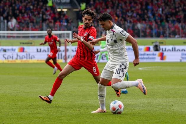 Eren Dinkci 8 1FC Heidenheim 1846 in action with Nadiem Amiri 10 1 FSV Mainz 05 , 1 FC Heidenheim vs 1 FSV Mainz 05, Fußball, Maenner, Bundesliga, DFL, Saison 2025 2026, 34 Spieltag, Rueckrunde, 16 05 2026 DFB regulations prohibit any use of photographs as image sequences and or quasi video Heidenheim Baden Wuerttemberg Germany Copyright: xkolbert-press MartinxAgüerax
