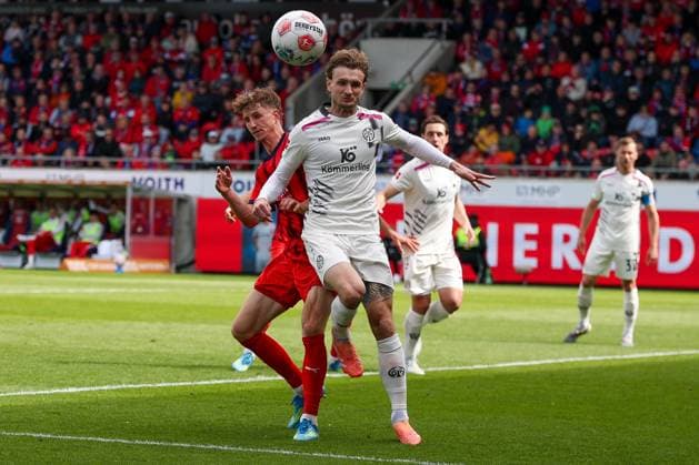 Jan Schoeppner 3 1FC Heidenheim 1846 and Kacper Potulski 48 1 FSV Mainz 05 in action, 1 FC Heidenheim vs 1 FSV Mainz 05, Football, Men, Bundesliga, DFL, Saison 2025 2026, 34 Spieltag, Rueckrunde, 16 05 2026 DFB regulations prohibit any use of photographs as image sequences and or quasi video Heidenheim Baden Wuerttemberg Germany Copyright: xkolbert-press MartinxAgüerax