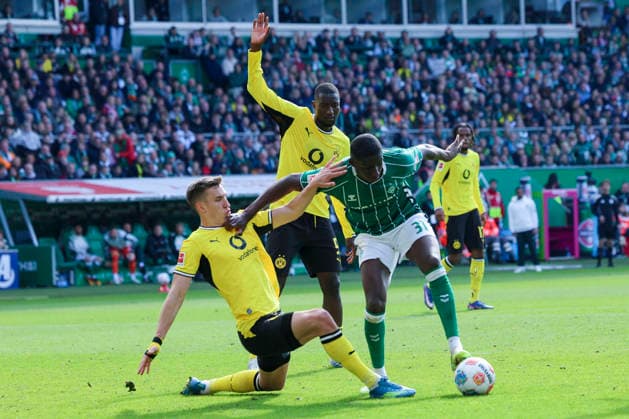 Nico Schlotterbeck Borussia Dortmund , Serhou Guirassy Borussia Dortmund and Karim Coulibaly Werder Bremen battle for the ball, Bundesliga, SV Werder Bremen v Borussia Dortmund, Weserstadion on May 16, 2026 in Bremen, Germany Photo by Marco Steinbrenner DeFodi Images Nico Schlotterbeck Borussia Dortmund , Serhou Guirassy Borussia Dortmund and Karim Coulibaly Werder Bremen battle for the ball, Bundesliga, SV Werder Bremen v Borussia Dortmund, Weserstadion, May 16, 2026 in Bremen, Germany Photo by Marco Steinbrenner DeFodi Images DFL regulations prohibit any use of photographs as image sequences and or quasi video