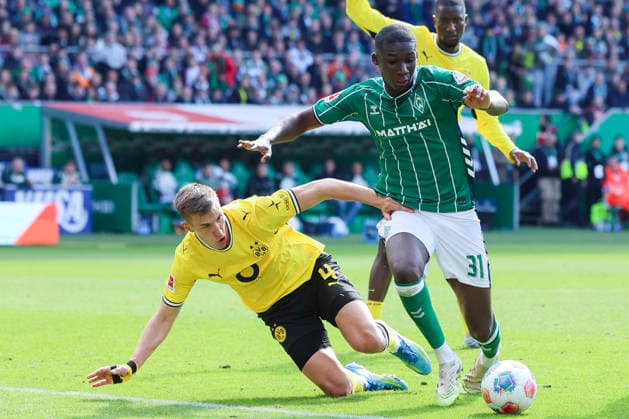 Nico Schlotterbeck Borussia Dortmund and Karim Coulibaly Werder Bremen battle for the ball, Bundesliga, SV Werder Bremen v Borussia Dortmund, Weserstadion, May 16, 2026 in Bremen, Germany Photo by Marco Steinbrenner DeFodi Images Nico Schlotterbeck Borussia Dortmund and Karim Coulibaly Werder Bremen battle for the ball, Bundesliga, SV Werder Bremen v Borussia Dortmund, Weserstadion, May 16, 2026 in Bremen, Germany Photo by Marco Steinbrenner DeFodi Images DFL regulations prohibit any use of photographs as image sequences and or quasi video