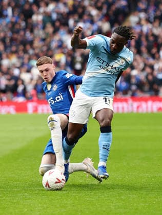 London, England, 16th May 2026. Cole Palmer of Chelsea tackles Jeremy Doku of Manchester City during the Chelsea vs Manchester City FA Cup Final match at Wembley Stadium, London. Picture credit should read: David Klein Sportimage EDITORIAL USE ONLY. No use with unauthorised audio, video, data, fixture lists, club league logos or live services. Online in-match use limited to 120 images, no video emulation. No use in betting, games or single club league player publications. SPI_051_DK_Chelsea_Manchester_City SPI-4803-0052