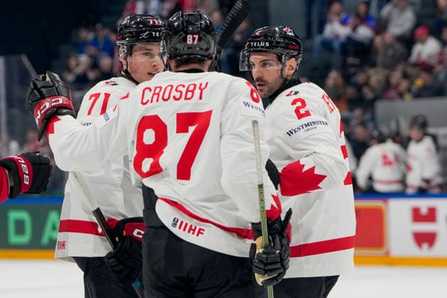FRIBOURG, SWITZERLAND MAY 16 Macklin Celebrini of Canada L celebrated for his goal by Sidney Crosby of Canada C and Dylan Demelo of Canada R during the 2026 IIHF Ice Hockey World Championship Switzerland game between Italy and Canada at BCF Arena on May 16, 2026 in Fribourg, Fribourg Fribourg BCF Arena Fribourg Switzerland Copyright: xJustPictures.ch JarixPestelaccix jp-en-EuSpIm-JP6_JAR_Italy_Canada_16May2026_00053