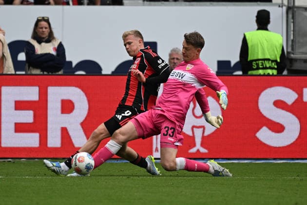 16 05 2026, xjhx, Soccer 1 Bundesliga, Eintracht Frankfurt VfB Stuttgart v l Foul by Alexander Nübel VfB Stuttgart on Jonathan Jonny Burkardt Eintracht Frankfurt DFL DFB REGULATIONS PROHIBIT ANY USE OF PHOTOGRAPHS as IMAGE SEQUENCES and or QUASI VIDEO Frankfurt am Main