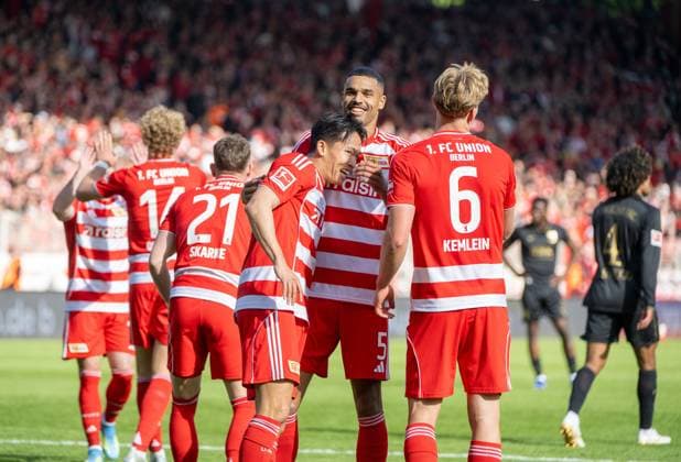 Soccer, Men, Season 2025 2026, 1 Bundesliga 34 Matchday , 1 FC Union Berlin FC Augsburg, v l Woo Yeong Jeong Wooyeong, 1 FC Union Berlin , Danilho Doekhi 1 FC Union , Aljoscha Kemlein 1 FC Union Berlin , Cheering after goal to 4 0, 16 05 2026, Copyright: xMatthiasxKochx