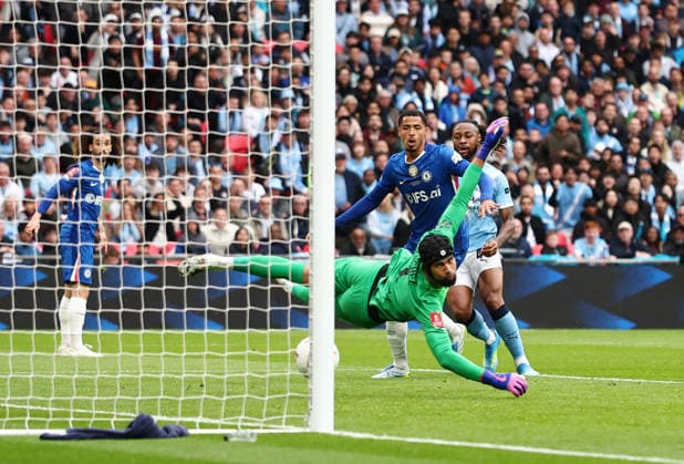 London, England, 16th May 2026. Antoine Semenyo of Manchester City score the first goal past Robert Sanchez of Chelsea during the Chelsea vs Manchester City FA Cup Final match at Wembley Stadium, London. Picture credit should read: David Klein Sportimage EDITORIAL USE ONLY. No use with unauthorised audio, video, data, fixture lists, club league logos or live services. Online in-match use limited to 120 images, no video emulation. No use in betting, games or single club league player publications. SPI_059_DK_Chelsea_Manchester_City SPI-4803-0060