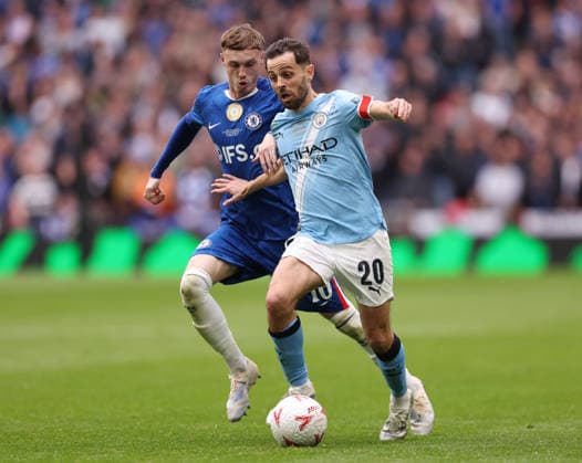 London, England, 16th May 2026. Cole Palmer of Chelsea tussles with Bernardo Silva of Manchester City during the Chelsea vs Manchester City FA Cup Final match at Wembley Stadium, London. Picture credit should read: David Klein Sportimage EDITORIAL USE ONLY. No use with unauthorised audio, video, data, fixture lists, club league logos or live services. Online in-match use limited to 120 images, no video emulation. No use in betting, games or single club league player publications. SPI_071_DK_Chelsea_Manchester_City SPI-4803-0072