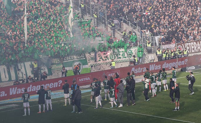 The Wolfsburg fans celebrate their team Football, 1 BL, Season 2025 2026, Men, FC St Pauli vs VfL Wolfsburg, Matchday 34 , 1 3 Wolfsburg thus in the relegation and St Pauli is relegated DFL REGULATIONS PROHIBIT ANY USE OF PHOTOGRAPHS AS IMAGE SEQUENCES AND OR QUASI VIDEO