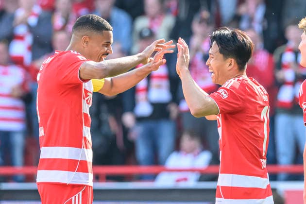 v l Danilho Doekhi 1 FC Union Berlin, 05 , Woo yeong Jeong 1 FC Union Berlin, 11 , shoots goal for 4 0, goal, hit, jubilation, jubilation, joy, enthusiasm, celebrates, celebreting the goal, joy, jubilation, cheering, GER, Berlin, 1 FC Union Berlin vs FC Augsburg, 1 Bundesliga, Football, DFB, last matchday, Season 2025 2026, Alte Försterei, May 16, 2026, DFB DFL REGULATES PROHIBIT ANY USE OF PHOTOGRAPHS AS IMAGE SEQUENCES AND OR QUASI VIDEO, Copyright: HMBxMedia UwexKoch