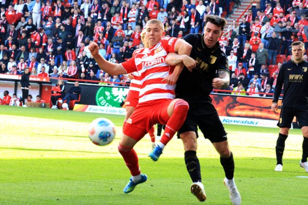 DEU, DFL, 1 FBL, 1 FC Union vs FC Augsburg, 16 05 2026, Stadion Alte Foersterei, Berlin, DEU, DFL, 1 FBL, 1 FC Union vs FC Augsburg, in the picture Dmytro Bogdanov 1 FC Union Berlin 30 , CEDRIC ZESIGER FC Augsburg 16 DFL regulations prohibit any use of Photographs as image sequences and or quasi video nordphotoxGmbHx xEngler nph00076