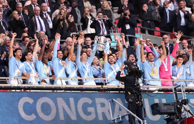 London, England, 16th May 2026. John Stones of Manchester City and Bernardo Silva of Manchester City lift the FA Cup 2026 during the Chelsea vs Manchester City FA Cup Final match at Wembley Stadium, London. Picture credit should read: David Klein Sportimage EDITORIAL USE ONLY. No use with unauthorised audio, video, data, fixture lists, club league logos or live services. Online in-match use limited to 120 images, no video emulation. No use in betting, games or single club league player publications. SPI_083_DK_Chelsea_Manchester_City SPI-4803-0083