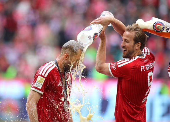 Football, Men, Bundesliga, Season 2025 2026, FC Bayern München 1 FC Köln, Allianz Arena Champion celebration after the match with beer shower, Weissbierdusche, here Konrad Laimer FC Bayern München li with Harry Kane FC Bayern München re DFB, DFL regulations prohibit any use of photographs as image sequences and or quasi video