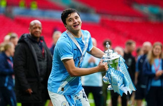 Abdukodir Khusanov of Manchester City celebrates Chelsea v Manchester City, Emirates FA Cup Final, Football, Wembley Stadium, London, UK - 16 May 2026London Wembley Stadium United Kingdom EDITORIAL USE ONLY No use with unauthorised audio, video, data, fixture lists, club league logos or live services. Online in-match use limited to 120 images, no video emulation. No use in betting, games or single club league player publications.  Copyright: xJavierxGarcia Shutterstockx 16876844bz