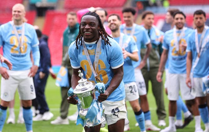 Chelsea v Manchester City - Emirates FA Cup Final Jeremy Doku of Manchester City celebrates with Trophy after winning the Emirates FA Cup Final match between Chelsea and Manchester City on May 16, 2026 in London, England. WARNING! This Photograph May Only Be Used For Newspaper And Or Magazine Editorial Purposes. May Not Be Used For Publications Involving 1 player, 1 Club Or 1 Competition Without Written Authorisation From Football DataCo Ltd. For Any Queries, Please Contact Football DataCo Ltd on +44 (0) 207 864 9121 London Wembley Stadium England United Kingdom Copyright: xAllstarxPicturexLibraryxLtdx