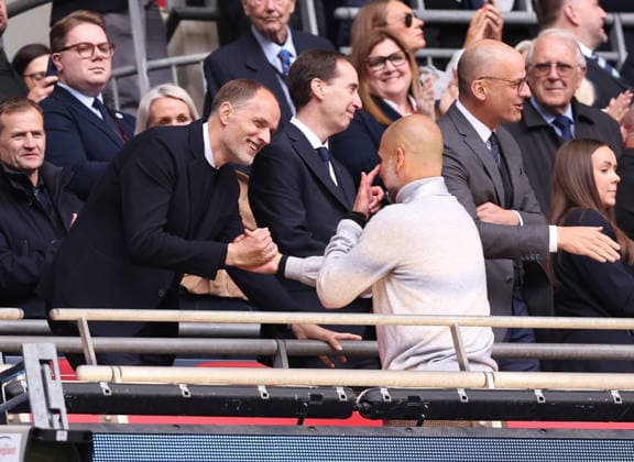 London, England, 16th May 2026. England manager Thomas Tuchel celebrates with Pep Guardiola coach of Manchester City during the Chelsea vs Manchester City FA Cup Final match at Wembley Stadium, London. Picture credit should read: David Klein Sportimage EDITORIAL USE ONLY. No use with unauthorised audio, video, data, fixture lists, club league logos or live services. Online in-match use limited to 120 images, no video emulation. No use in betting, games or single club league player publications. SPI_120_DK_Chelsea_Manchester_City SPI-4803-0125