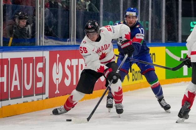 FRIBOURG, SWITZERLAND MAY 16 Mark Scheifele of Canada L against Carmine Buono of Italy R during the 2026 IIHF Ice Hockey World Championship Switzerland game between Italy and Canada at BCF Arena on May 16, 2026 in Fribourg, Fribourg Fribourg BCF Arena Fribourg Switzerland Copyright: xJustPictures.ch JarixPestelaccix jp-en-EuSpIm-JP6_JAR_Italy_Canada_16May2026_00115