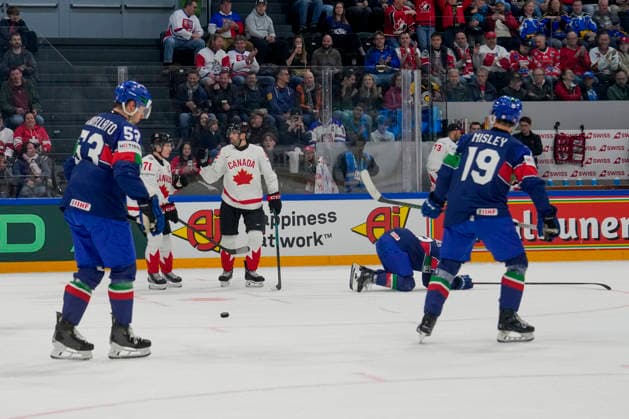 FRIBOURG, SWITZERLAND MAY 16 Evan Bouchard of Canada C celebrated by Macklin Celebrini of Canada 2nd L for his goal during the 2026 IIHF Ice Hockey World Championship Switzerland game between Italy and Canada at BCF Arena on May 16, 2026 in Fribourg, Fribourg Fribourg BCF Arena Fribourg Switzerland Copyright: xJustPictures.ch JarixPestelaccix jp-en-EuSpIm-JP6_JAR_Italy_Canada_16May2026_00074