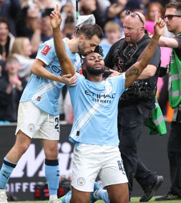Antoine Semenyo (MC) Bernardo Silva (MC) celebrate after Antoine Semenyo (MC) scored the winning goal at the Emirates FA Cup Final match Chelsea v Manchester City, at Wembley Stadium, London, UK on 16th May, 2026. 