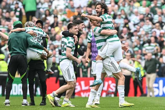 Celtic v Heart of Midlothian William Hill Premiership Daizen Maeda of Celtic is hoisted into the air by teammates at full time as other teammates and staff celebrate their sides win during the William Hill Premiership match at Celtic Park, Glasgow 16 05 2026 UK Newspapers OUT Copyright: xJamiexJohnstonx FIL-23440-0203