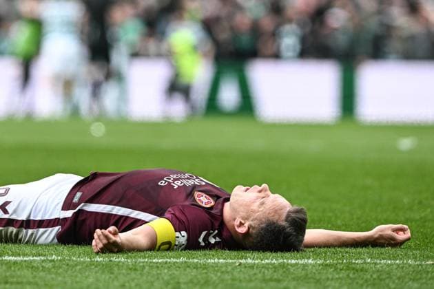 Celtic v Heart of Midlothian William Hill Premiership Lawrence Shankland of Heart of Midlothian collapses to the ground after his side concede a thrid goal during the William Hill Premiership match at Celtic Park, Glasgow 16 05 2026 UK Newspapers OUT Copyright: xJamiexJohnstonx FIL-23440-0218