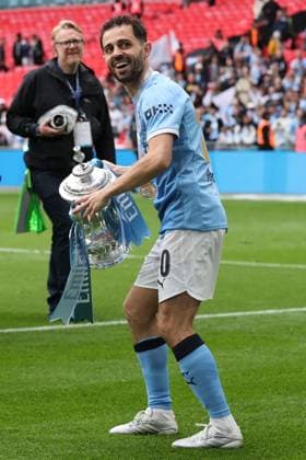 Chelsea v Manchester City. Bernardo Silva of Manchester City with the trophy at the end of the FA Cup Final Chelsea v Manchester City. Football. The Emirates FA Cup Final. Wembley Stadium, London, UK. 16 MAY 2026Wembley Wembley Stadium LONDON United Kingdom EDITORIAL USE ONLY No use with unauthorised audio, video, data, fixture lists, club league logos or live services. Online in-match use limited to 120 images, no video emulation. No use in betting, games or single club league player publications.  Copyright: xJASONPIX Shutterstockx 16878747cj