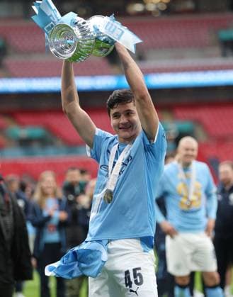 . - Chelsea v Manchester City, The Emirates FA Cup Final 2026, Wembley Stadium, London, England, 16th May 2026. Daniel Weir Crystal Pix Abdukodir Khusanov of Manchester City holds aloft The Emirates FA Cup Trophy in celebration after winning the 2026 FA Cup Final. - Chelsea v Manchester City, The Emirates FA Cup Final 2026, Wembley Stadium, London, England, 16th May 2026. Daniel Weir Crystal Pix London Wembley Stadium England Copyright: xDanielxWeirx CP_Chelsea_Manchester_City_160526_DW46