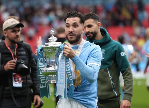 . - Chelsea v Manchester City, The Emirates FA Cup Final 2026, Wembley Stadium, London, England, 16th May 2026. Daniel Weir Crystal Pix Rayan Cherki of Manchester City holds aloft The Emirates FA Cup Trophy in celebration after winning the 2026 FA Cup Final. - Chelsea v Manchester City, The Emirates FA Cup Final 2026, Wembley Stadium, London, England, 16th May 2026. Daniel Weir Crystal Pix London Wembley Stadium England Copyright: xDanielxWeirx CP_Chelsea_Manchester_City_160526_DW51