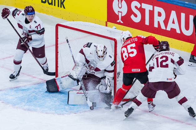 ZURICH, SWITZERLAND - MAY 16: Sven Andrighetto (Switzerland, 85) against Kristers Gudlevskis (Latvia, 50) during the Preliminary Round - Group A Match 9 between Switzerland and Latvia at the IIHF Ice hockey, Eishockey World Championship, WM, Weltmeisterschaft 2026, Swiss Life Arena on May 16, 2026 in Zurich, Switzerland. Zurich Switzerland Copyright: xTimoxSteinx