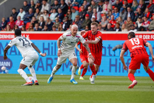 Soccer, 1 Bundesliga, Matchday 34, 2025 2026, 1 FC Heidenheim vs 1 FSV Mainz 05, 16 05 2026, Voith Arena, Heidenheim, Germany, Phillipp TIETZ 1 FSV Mainz 05 20 center in duel with Patrick MAINKA 1 FC Heidenheim 6 right , left Sheraldo BECKER 1 FSV Mainz 05 23 and right outside Jonas FÖHRENBACH 1 FC Heidenheim 19 Heidenheim Voith Arena Baden Württemberg Germany Copyright: xGaetanoxDixRosax