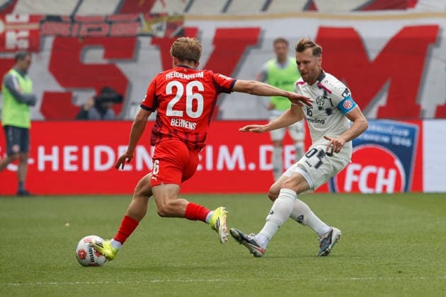 Football, 1 Bundesliga, Matchday 34, 2025 2026, 1 FC Heidenheim vs 1 FSV Mainz 05, 16 05 2026, Voith Arena, Heidenheim, Germany, Hennes BEHRENS 1 FC Heidenheim 26 li in duel with Silvan WIDMER 1 FSV Mainz 05 30 Heidenheim Voith Arena Baden Württemberg Germany Copyright: xGaetanoxDixRosax