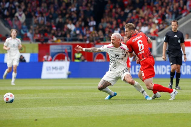 Football, 1 Bundesliga, Matchday 34, 2025 2026, 1 FC Heidenheim vs 1 FSV Mainz 05, 16 05 2026, Voith Arena, Heidenheim, Germany, Phillipp TIETZ 1 FSV Mainz 05 20 li in duel with Patrick MAINKA 1 FC Heidenheim 6 Heidenheim Voith Arena Baden Württemberg Germany Copyright: xGaetanoxDixRosax
