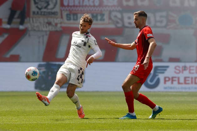 Football, 1 Bundesliga, Matchday 34, 2025 2026, 1 FC Heidenheim vs 1 FSV Mainz 05, 16 05 2026, Voith Arena, Heidenheim, Germany, Stefan POSCH 1 FSV Mainz 05 4 li in duel with Marvin PIERINGER 1 FC Heidenheim 18 Heidenheim Voith Arena Baden Württemberg Germany Copyright: xGaetanoxDixRosax