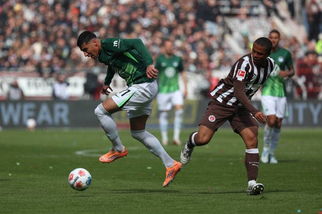 St Pauli vs VfL, 1 BL Hamburg, 16 05 2026, Football, Men, Season 2025 2026, 1 BL, FC St Pauli vs VfL Wolfsburg Adam Daghim VfL Wolfsburg , Joel Chima Fujita St Pauli DFL DFB REGULATIONS PROHIBIT ANY USE OF PHOTOGRAPHS as IMAGE SEQUENCES and or QUASI VIDEO Millerntor Stadion Germany