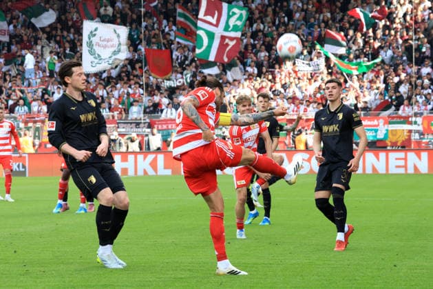 DEU, DFL, 1 FBL, 1 FC Union vs FC Augsburg, 16 05 2026, Stadion Alte Foersterei, Berlin, DEU, DFL, 1 FBL, 1 FC Union vs FC Augsburg, in the picture Christopher Trimmel 1 FC Union Berlin 28 , Michael Gregoritsch FC Augsburg 38 , Merkt Koemuer FC Augsburg 36 DFL regulations prohibit any use of Photographs as image sequences and or quasi video nordphotoxGmbHx xEngler nph00076