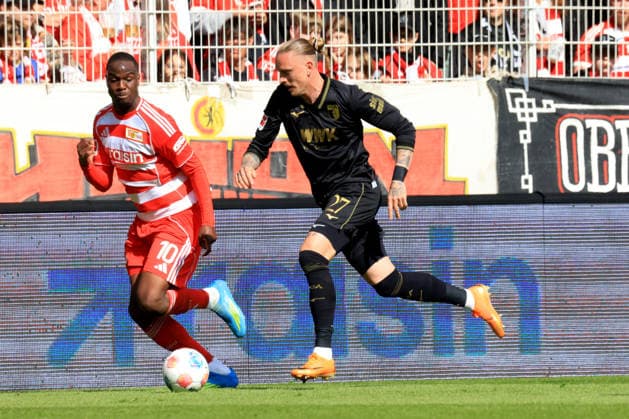 DEU, DFL, 1 FBL, 1 FC Union vs FC Augsburg, 16 05 2026, Stadion Alte Foersterei, Berlin, DEU, DFL, 1 FBL, 1 FC Union vs FC Augsburg, pictured Ilyas Ansah 1 FC Union Berlin 10 , Marius Wolf FC Augsburg 27 DFL regulations prohibit any use of Photographs as image sequences and or quasi video nordphotoxGmbHx xEngler nph00076