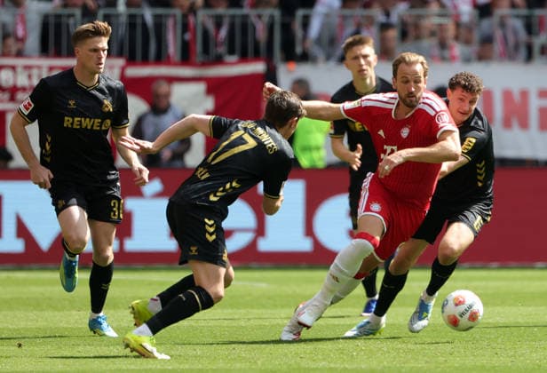 15 05 2026, 1 Bundesliga, Matchday 34, FC Bayern vs 1 FC Koeln, Allianz Arena Muenchen, Soccer, Sports, in the picture Marius Buelter 1 FC Koeln , Alessio Castro Montes 1 FC Koeln , and Harry Kane FC Bayern Muenchen vs Eric Martel 1 FC Koeln