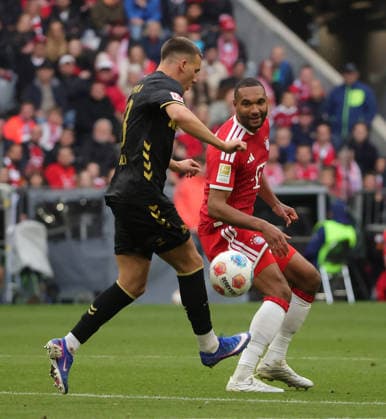 15 05 2026, 1 Bundesliga, Matchday 34, FC Bayern vs 1 FC Koeln, Allianz Arena Muenchen, Football, Sport, in picture Said El Mala 1 FC Koeln vs Jonathan Tah FC Bayern Muenchen
