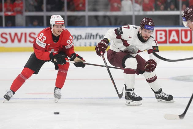 Ice Hockey World Championship 2026 SUI LAT Theo Rochette vs Martins Dzierkals 16 05 2026 Swiss Life Arena Zuerich , SWITZERLAND, Men IIHF Ice Hockey World Championship Zurich 2026 Group Switzerland Latvia Theo Rochette li,Switzerland vs Martins Dzierkals Latvia