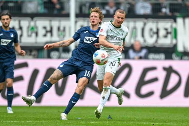 v li in duel Wouter Burger Hoffenheim 18 Nico Elvedi Moenchengladbach 30 16 05 2026 ¢ Football ¢ Borussia Moenchengladbach vs TSG Hoffenheim, Borussia Park, Moenchengladbach, DFB DFL REGULATIONS PROHIBIT ANY USE OF PHOTOGRAPHS AS IMAGE SEQUENCES AND OR QUASI VIDEO Copyright: xpepphotox xHorstxMauelshagenx pep00321, pep_20260516_hm_358493