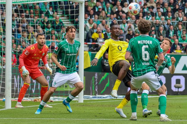 Bremen, Germany 16 May 2026 34 Matchday 1 Bundesliga Werder Bremen vs Borussia Dortmund In the picture from left third Serhou Guirassy BVB tries to score a goal in the Bremen penalty area, behind him goalkeeper Mio Backhaus Werder Bremen and Olivier Deman Werder Bremen and Jens Stage Werder Bremen DFL regulations prohibit any use of photographs as image sequences and or quasi video Copyright: HMBxMedia MadeleinexFantini